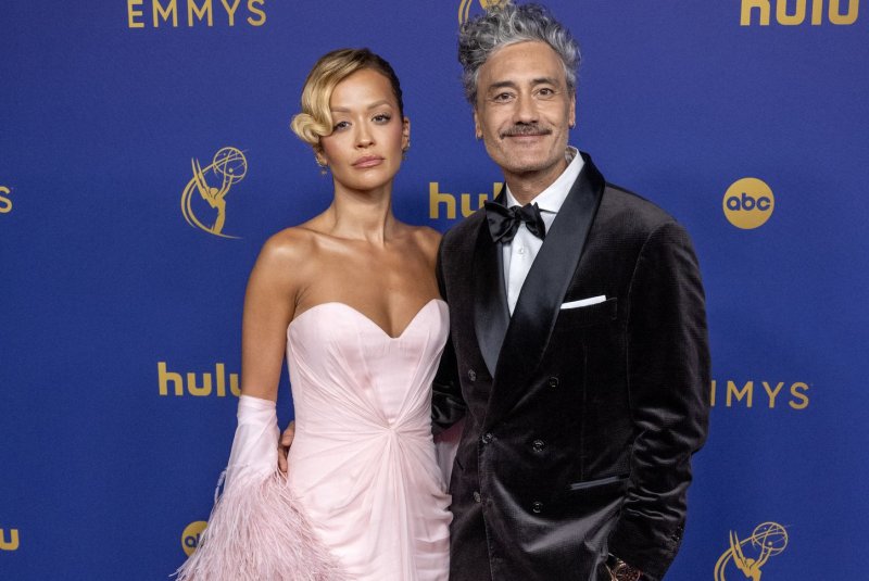 Rita Ora and Taika Waititi arrive for the Primetime Emmy Awards at the Peacock Theater in Los Angeles in 2024. Waititi was revealed as the Lucky Duck non-contestant character on "The Masked Singer" Wednesday night. File Photo by Alex Gallardo/UPI