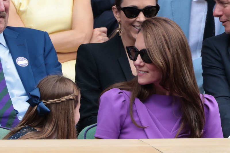 Kate Middleton (R) and daughter Princess Charlotte attend the Wimbledon Championships in July. Middleton and Prince William celebrated Charlotte's 10th birthday Friday. File Photo by Hugo Philpott/UPI